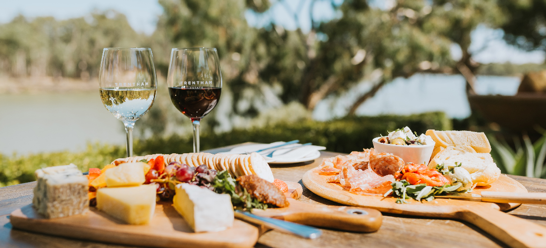 Charcuterie platters in outdoor dining setting